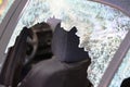 Broken car window and cracked glass of a automobile. Empty copy space Royalty Free Stock Photo