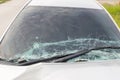 Broken car windshield .Crash windshield glass the broken and damaged car. Tempered glass shattered in an accident. Broken Windshie Royalty Free Stock Photo