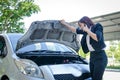 A broken car woman calls for a technician. Royalty Free Stock Photo
