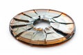 Broken cd lying on white background representing data loss concept Royalty Free Stock Photo