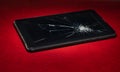 Broken cell phone with cracked screen Royalty Free Stock Photo