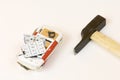 Broken cell phone and hammer Royalty Free Stock Photo