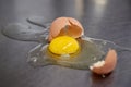 Broken chicken egg on the iron table close-up. horizontal view. a raw egg Royalty Free Stock Photo