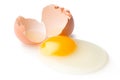 A broken chicken egg lies on a white background with a shell, yo Royalty Free Stock Photo