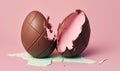 a broken chocolate easter egg with pink frosting on a pink background with a crack in the middle of the egg and the rest of the Royalty Free Stock Photo