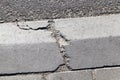 Broken concrete curb