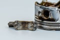 Broken connecting rod and engine piston isolated on white background Royalty Free Stock Photo