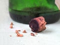 The broken cork from the old wine is on the table. Royalty Free Stock Photo