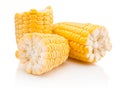 Broken corn on cobs kernels peeled on white background