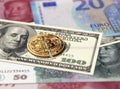 Broken or cracked Bitcoin coin on banknotes. Bitcoin price crash concept. 3D Rendering Royalty Free Stock Photo