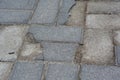Broken and cracked paving stones.Damaged pavement need repair Royalty Free Stock Photo