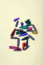 Broken crayon tips. Broken crayons. Crushed crayons. Royalty Free Stock Photo