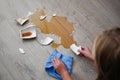 A broken cup of coffee fell on laminate, coffee spilled on floor Royalty Free Stock Photo
