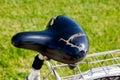 Broken and damaged bike saddle due to heat and usage Royalty Free Stock Photo