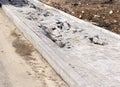 Broken damaged sidewalk. dangerous road Royalty Free Stock Photo