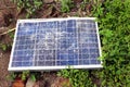 Broken destroyed cracked hole in solar panel after hailstorm. solar cell destroyed cracked hole in solar panel Royalty Free Stock Photo