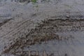 Broken dirt road after heavy rain. Swampy lagoon of a road demonstrates the most common problem in maintaining rural roads Royalty Free Stock Photo