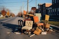 broken and discarded furniture on sidewalk