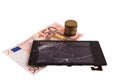 Broken display with cracked display and money, euro notes and coins. concept repair fee in the service Royalty Free Stock Photo