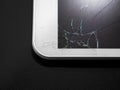 Broken display. Cracked glass tablet, device