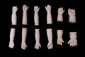 Broken Doll Body Parts on Black Background Royalty Free Stock Photo