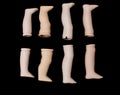 Broken Doll Body Parts Feet on Black Background Royalty Free Stock Photo