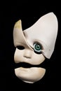 Broken Doll Parts on Black Background Royalty Free Stock Photo