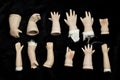 Broken Doll Parts on Black Background Royalty Free Stock Photo