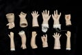 Broken Doll Parts on Black Background Royalty Free Stock Photo