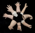 Broken Doll Parts on Black Background Royalty Free Stock Photo