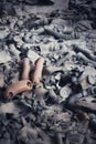 A broken doll's legs on a pile of soviet gas masks in an abandoned building in Pripyat, Ukraine, Chernobyl exclusion zone. Royalty Free Stock Photo