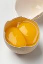 Broken double yolk egg Royalty Free Stock Photo