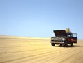 Broken down 4WD in the desert Royalty Free Stock Photo