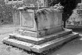 Broken down altar tomb in Black and White