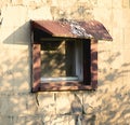 Broken down window on side of building Royalty Free Stock Photo