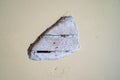 Broken drywall exposing nails, wood framing and studs from the wall Royalty Free Stock Photo