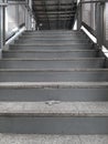 Broken edge of granite stair of train station Royalty Free Stock Photo