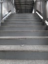 Broken edge of granite stair of train station Royalty Free Stock Photo