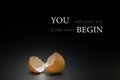 broken egg on black background and epigram. Royalty Free Stock Photo