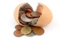 Broken egg and coin