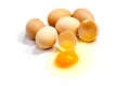 Broken egg in eggshell half and raw egg isolated Royalty Free Stock Photo