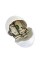 Broken egg with fake money Royalty Free Stock Photo