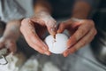 Broken egg in female hands, cook eggplant. delicious breakfast Royalty Free Stock Photo