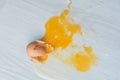 Broken egg on floor. Royalty Free Stock Photo