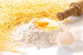 broken egg in flour and pasta Royalty Free Stock Photo