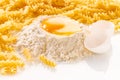 broken egg in flour and pasta Royalty Free Stock Photo