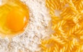 broken egg in flour and pasta Royalty Free Stock Photo