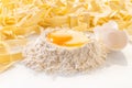 broken egg in flour and pasta Royalty Free Stock Photo