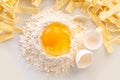 broken egg in flour and pasta Royalty Free Stock Photo