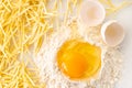 broken egg in flour and pasta Royalty Free Stock Photo